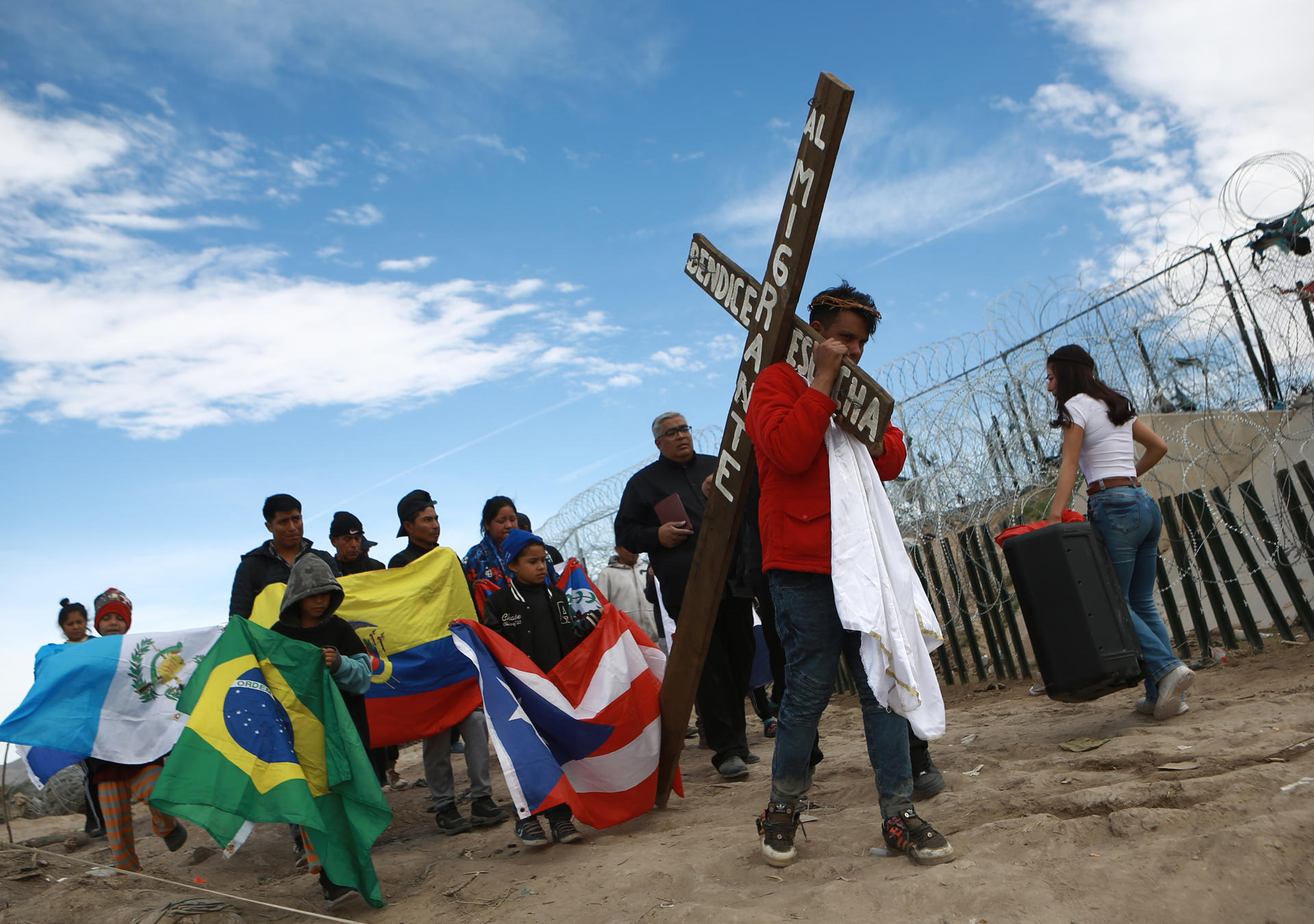El viacrucis de migrantes en México, semana santa  en Venezuela y Haití